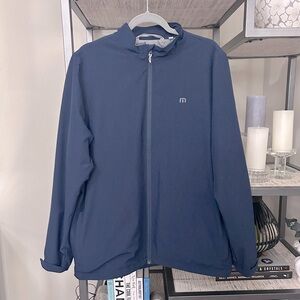 Travis Mathew Men’s size large navy lined long sleeve full zip jacket